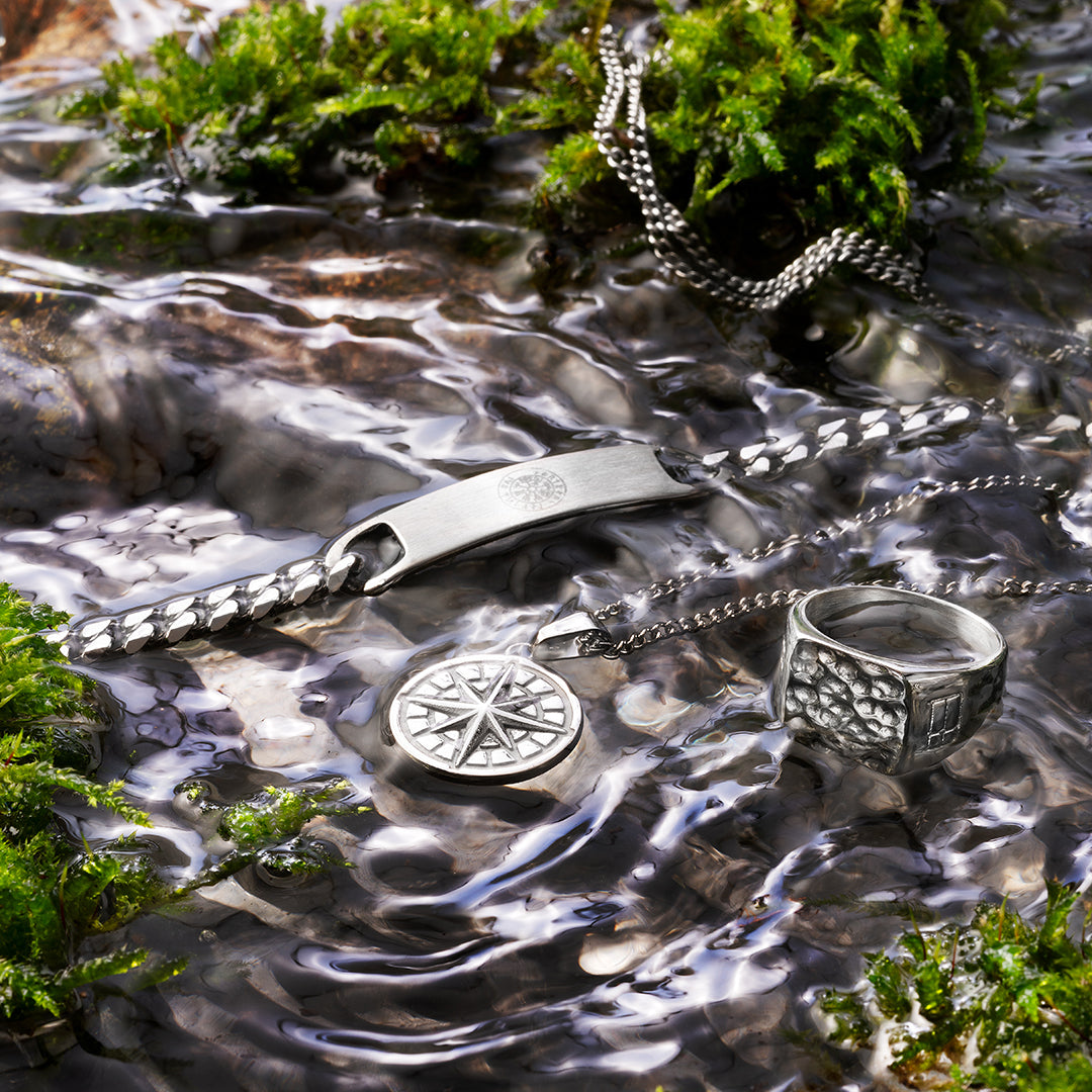 Some silver jewelry from Northern Legacy in water.