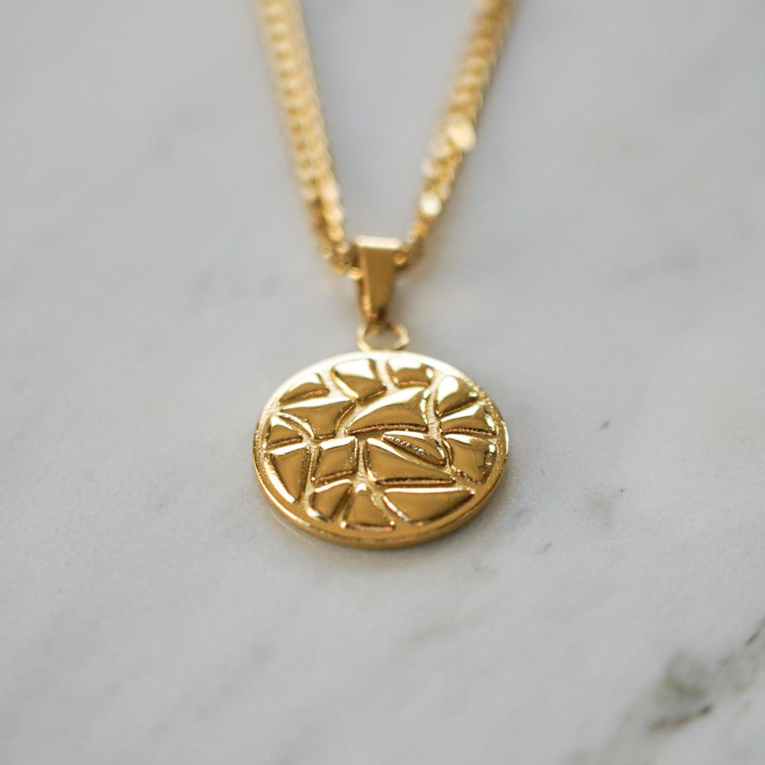 NL Earthquake pendant - Gold-toned